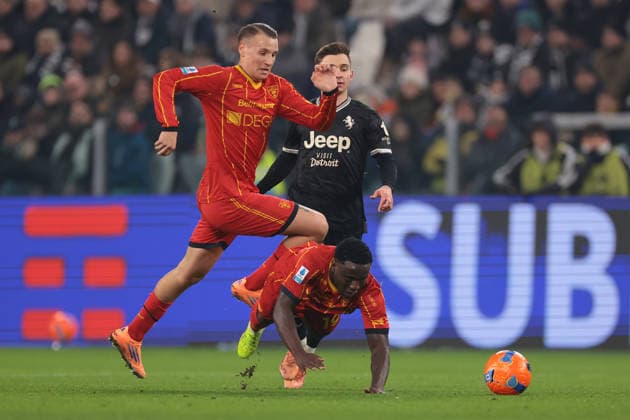 Turin, Italy, 3rd January 2026. Francesco Camarda of US Lecce hurdles team mate Lameck Banda after he clashed with Francisco Conceicao of Juventus during the Juventus vs Lecce Serie A match at Allianz Stadium, Turin. Picture credit should read: Jonathan Moscrop Sportimage EDITORIAL USE ONLY. No use with unauthorised audio, video, data, fixture lists, club league logos or live services. Online in-match use limited to 120 images, no video emulation. No use in betting, games or single club league player publications. SPI_008_JM_JUVE_LECCE SPI-4406-0008