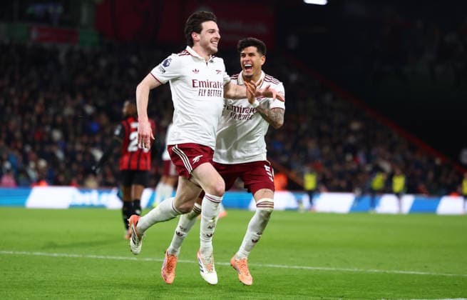 Bournemouth, England, 3rd January 2026. Declan Rice of Arsenal celebrates with Piero Hincapie of Arsenal after scoring to make it 3-1 during the AFC Bournemouth vs Arsenal Premier League match at the Vitality Stadium, Bournemouth. Picture credit should read: Paul Terry Sportimage EDITORIAL USE ONLY. No use with unauthorised audio, video, data, fixture lists, club league logos or live services. Online in-match use limited to 120 images, no video emulation. No use in betting, games or single club league player publications. SPI_052_PT_Bournemouth_Arsenal SPI-4428-0053