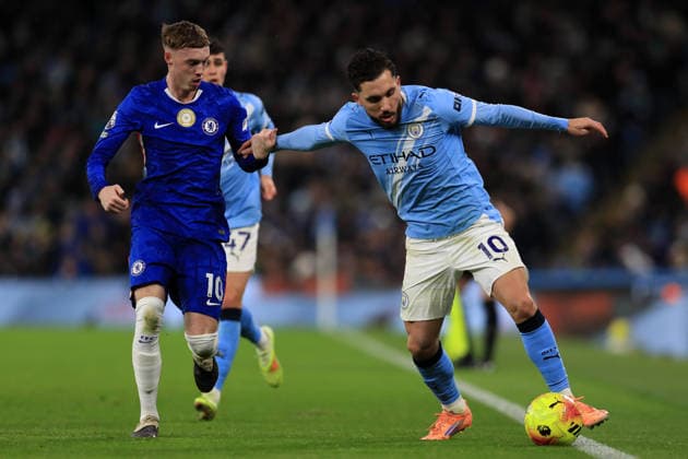 4th January 2026; Etihad Stadium, Manchester, Lancashire, England; Premier League Football, Manchester City versus Chelsea; Rayan Cherki of Manchester City hold off a challenge from Cole Palmer of Chelsea  DavidxBlunsden