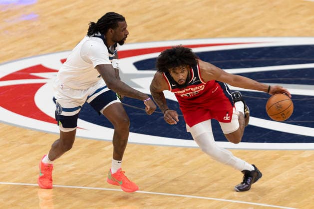 WASHINGTON, DC - JANUARY 04: Washington Wizards forward Marvin Bagley III (35) dribbles past Minnesota Timberwolves center Naz Reid (11) during a game between Minnesota Timberwolves and Washington Wizards on January 4, 2026 at the Capital One Arena in Washington, DC. (Photo by Charles Brock Icon Sportswire) NBA, Basketball Herren, USA JAN 04 Minnesota Timberwolves at Washington Wizards EDITORIAL USE ONLY Icon260104029