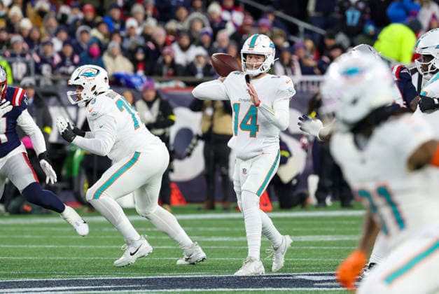 FOXBOROUGH, MA - JANUARY 04: Quinn Ewers 14 of the Miami Dolphins spots a target during a game between the New England Patriots and the Miami Dolphins on January 4, 2026, at Gillette Stadium in Foxborough, Massachusetts. (Photo by Fred Kfoury III Icon Sportswire) NFL, American Football Herren, USA JAN 04 Dolphins at Patriots EDITORIAL USE ONLY Icon482260104009