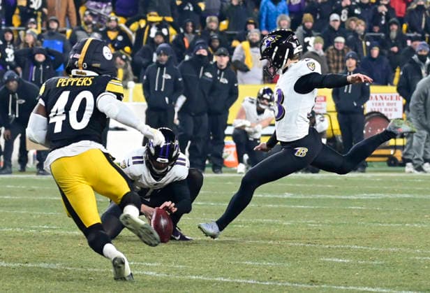 Baltimore Ravens kicker Tyler Loop (33) misses a 44 yard field giving the Pittsburgh Steelers the 26-24 win and the AFC Championship on the final play of the game at Acrisure Stadium on Sunday, January 4, 2026 in Pittsburgh.  PIT2026010412 ARCHIExCARPENTER