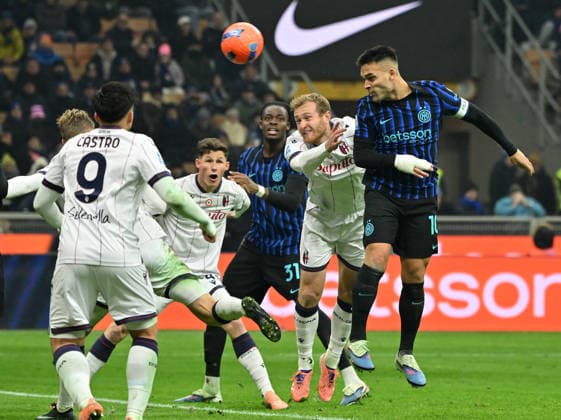 (260105) -- MILAN, Jan. 5, 2026 -- Inter Milan s Lautaro Martinez (1st R) heads to score during a Serie A football match between Inter Milan and Bologna in Milan, Italy, Jan. 4, 2026. (Photo by Xinhua) (SP)ITALY-MILAN-FOOTBALL-SERIE A-INTER MILAN VS BOLOGNA AlbertoxLingria 
