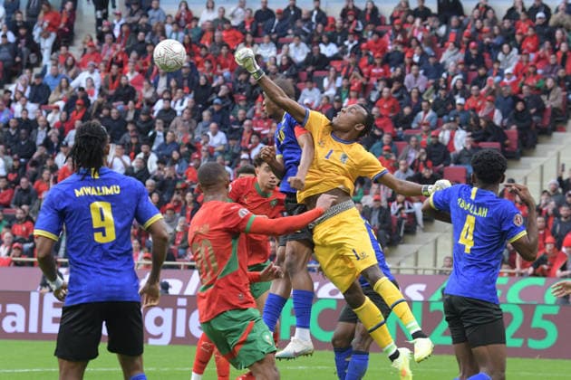 (260105) -- RABAT, Jan. 5, 2026 -- Tanzania s goalkeeper Hussein Masaranga (top R) makes a save during the Africa Cup of Nations round of 16 football match between Morocco and Tanzania in Rabat, Morocco, Jan. 4, 2026. (Photo by Xinhua) (SP)MOROCCO-RABAT-FOOTBALL-AFRICA CUP OF NATIONS-MOROCCO VS TANZANIA Aissa 