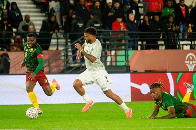RABAT, MEDINA, MOROCCO - JANUARY 4: Siyabonga Ngezana of South Africa and Nouhou Tolo, Christopher Wooh of Cameroon during the Africa Cup of Nations (AFCON) match between South Africa and Cameroon at Al-Medina Stadium on January 4th, 2026 in Rabat, Morocco. Photo by Vincent Kamto Copyright: xVincentxKAMTOx