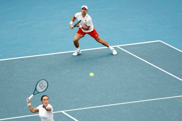 TENNIS UNITED CUP SYDNEY, Jan Zielinski of team Poland playing with Katarzyna Kawa of team Poland in their Group F doubles match against Demi Schuurs of Team Netherlands and David Pel of Team Netherlands during day six of the 2026 United Cup at Ken Rosewall Arena in Sydney, Wednesday, January 7, 2026. ( NO ARCHIVING, EDITORIAL USE ONLY SYDNEY NEW SOUTH WALES AUSTRALIA  Copyright: xMARKxEVANSx 20260107143080485259