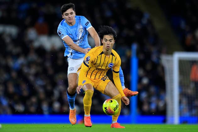 Manchester City v Brighton and Hove Albion, Premier League Kaoru Mitoma (22) of Brighton & Hove Albion is challenged by Abdukodir Khusanov (45) of Manchester City during the Premier League match between Manchester City and Brighton and Hove Albion at the Etihad Stadium, Manchester, UK on 7 January 2026. Manchester Etihad Stadium Manchester UK Editorial use only DataCo restrictions apply See www.football-dataco.com , Copyright: xConorxMolloyx PSI-23536-0018