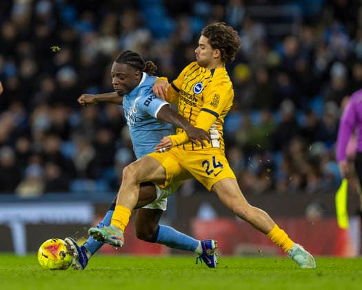 7th January 2026; Etihad Stadium, Manchester, Lancashire, England; Premier League Football, Manchester City versus Brighton and Hove Albion; Jeremy Doku of Manchester City is tackled by Ferdi Kadioglu of Brighton  TimxWilliams Content restricted for UK based newspaper