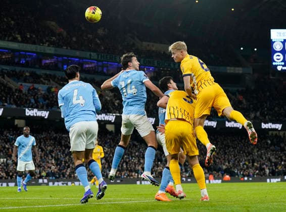 Manchester, England, 7th January 2026. Jan Paul van Hecke of Brighton directs a header on goal during the Manchester City vs Brighton and Hove Albion Premier League match at the Etihad Stadium, Manchester. Picture credit should read: Andrew Yates Sportimage EDITORIAL USE ONLY. No use with unauthorised audio, video, data, fixture lists, club league logos or live services. Online in-match use limited to 120 images, no video emulation. No use in betting, games or single club league player publications. SPI_029_AY_Man_City_Brighton SPI-4435-0024