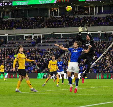 7th January 2026; Hill Dickinson Stadium, Liverpool, England; Premier League Football, Everton versus Wolverhampton Wanderers; Goalkeeper Jose Sa of Wolverhampton Wanderers beats James Tarkowski of Everton FC to the high ball  RogerxEvans Content restricted for UK based newspaper