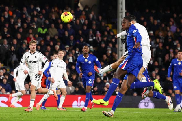 London, England, 7th January 2026. Raul Jimenez of Fulham scores to make it 1-0 while under pressure from Trevoh Chalobah of Chelsea during the Fulham vs Chelsea Premier League match at Craven Cottage, London. Picture credit should read: Paul Terry Sportimage EDITORIAL USE ONLY. No use with unauthorised audio, video, data, fixture lists, club league logos or live services. Online in-match use limited to 120 images, no video emulation. No use in betting, games or single club league player publications. SPI_042_PT_Fulham_Chelsea SPI-4434-0042