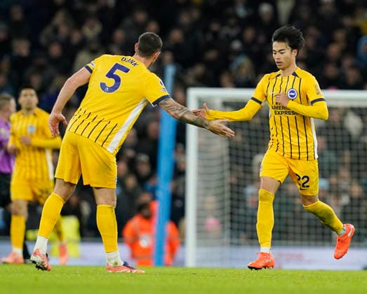 Manchester, England, 7th January 2026. Kaoru Mitoma of Brighton (r) celebrates scoring the equalising goal during the Manchester City vs Brighton and Hove Albion Premier League match at the Etihad Stadium, Manchester. Picture credit should read: Andrew Yates Sportimage EDITORIAL USE ONLY. No use with unauthorised audio, video, data, fixture lists, club league logos or live services. Online in-match use limited to 120 images, no video emulation. No use in betting, games or single club league player publications. SPI_049_AY_Man_City_Brighton SPI-4435-0049