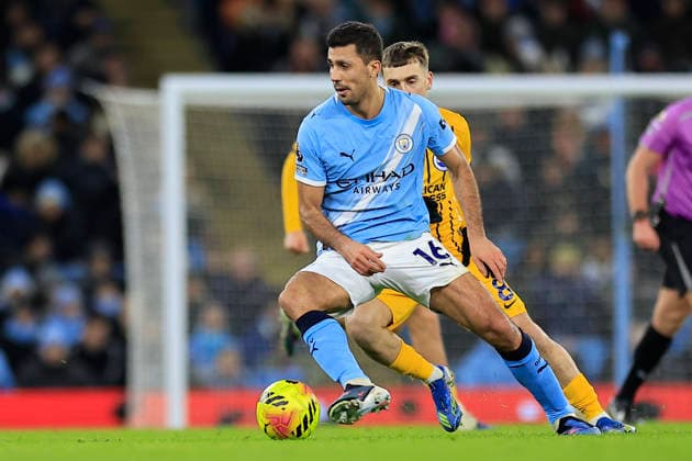 Manchester City v Brighton and Hove Albion, Premier League Rodrigo (16) of Manchester City turns with the ball watched by Brajan Gruda (8) of Brighton & Hove Albion during the Premier League match between Manchester City and Brighton and Hove Albion at the Etihad Stadium, Manchester, UK on 7 January 2026. Manchester Etihad Stadium Manchester UK Editorial use only DataCo restrictions apply See www.football-dataco.com , Copyright: xConorxMolloyx PSI-23536-0069