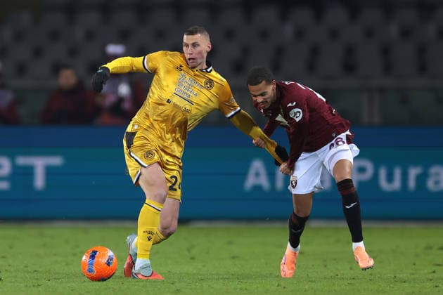 Turin, Italy, 7th January 2026. Cyril Ngonge of Torino FC tussles with Jakub Piotrowski of Udinese Calcio during the Torino vs Udinese Serie A match at Stadio Grande Torino, Turin. Picture credit should read: Jonathan Moscrop Sportimage EDITORIAL USE ONLY. No use with unauthorised audio, video, data, fixture lists, club league logos or live services. Online in-match use limited to 120 images, no video emulation. No use in betting, games or single club league player publications. SPI_058_JM_TORO_UDINESE_ SPI-4408-0058