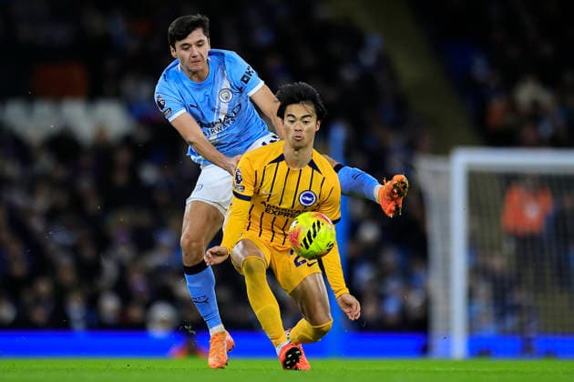 Manchester City v Brighton and Hove Albion, Premier League Kaoru Mitoma (22) of Brighton & Hove Albion is challenged by Abdukodir Khusanov (45) of Manchester City during the Premier League match between Manchester City and Brighton and Hove Albion at the Etihad Stadium, Manchester, UK on 7 January 2026. Manchester Etihad Stadium Manchester UK Editorial use only DataCo restrictions apply See www.football-dataco.com , Copyright: xConorxMolloyx PSI-23536-0108