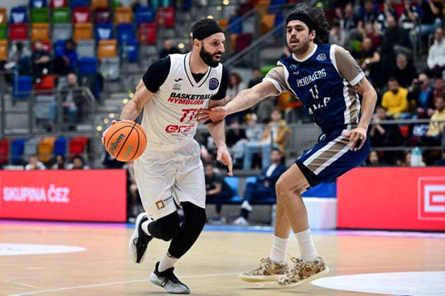 L-R Vojtech Hruban (Nymburk) and Erol Ersek (Heidelberg) in action during the second game for advancement to the round of 16 of the Basketball Champions League: Nymburk - Heidelberg, Prague, Czech Republic, January 8, 2026. (CTKxPhoto OndrejxDeml) CTKPhotoP2026010807893  CTKPhotoP2026010807893