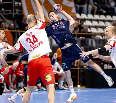 ALMERE - Norway s Patrick Helland Anderson in action against Denmark s Simon Hald Jensen during the Norway-Denmark Golden League handball match. The handball players are preparing for the European Championship, EM, Europameisterschaft SEM VAN DER WAL ANP xVIxANPxSportx xxANPxIVx 546712233 originalFilename: 546712233.jpg