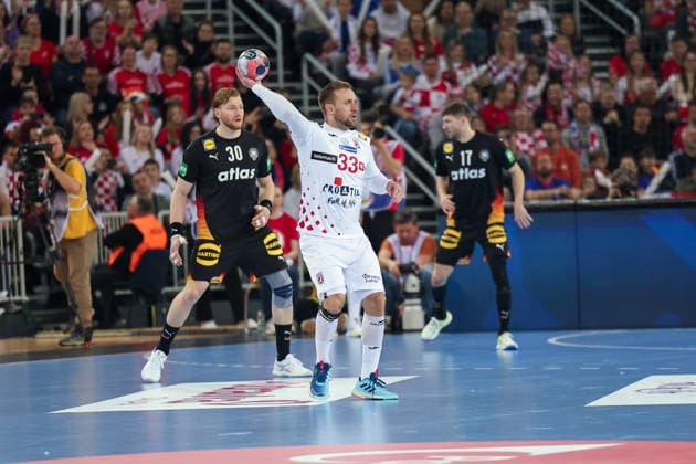 ZAGREB, CROATIA - JANUARY 8, 2026: Friendly match between Croatia and Germany, preparation for EURO 2026. CINDRIC Luka (33) with the ball, KIESLER Tom (30), ZERBE Lukas (17) 