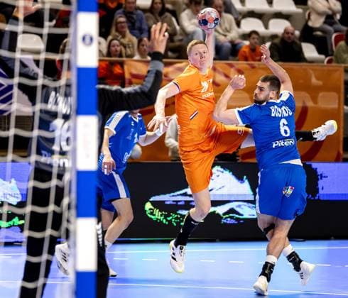 ALMERE - Niels Versteijnen of the Netherlands in action against Petros Boukovinas of Greece and Theodoros Boskos of Greece during the Netherlands-Greece Golden League handball match. The handball players are preparing for the European Championship, EM, Europameisterschaft SEM VAN DER WAL ANP xVIxANPxSportx xxANPxIVx 546719320 originalFilename: 546719320.jpg