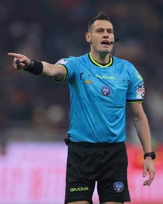 Milan, Italy, 8th January 2026. The Referee Maurizio Mariani reacts during the AC Milan vs Genoa Serie A match at Giuseppe Meazza, Milan. Picture credit should read: Jonathan Moscrop Sportimage EDITORIAL USE ONLY. No use with unauthorised audio, video, data, fixture lists, club league logos or live services. Online in-match use limited to 120 images, no video emulation. No use in betting, games or single club league player publications. SPI_019_JM_MILAN_GENOA_ SPI-4409-0019