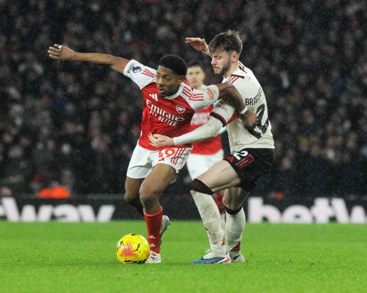 Football - 2025 2026 Premier League - Arsenal vs Liverpool - Emirates Stadium - Thursday 8th January 2026 Myles Lewis Skelly of Arsenal and Conor Bradley of Liverpool 