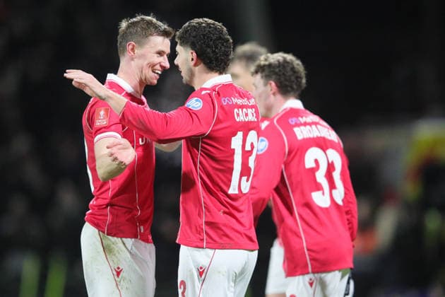 Wrexham FC v Nottingham Forest, FA Cup, 3rd Round Liberato Cacace of Wrexham celebrates scoring their first goal with team mates during the FA Cup match between Wrexham FC and Nottingham Forest at the Racecourse Ground, Wrexham, UK on 9 January 2026. Wrexham Racecourse Ground Wales UK Editorial use only DataCo restrictions apply See www.football-dataco.com , Copyright: xAlunxRobertsx PSI-23552-0019