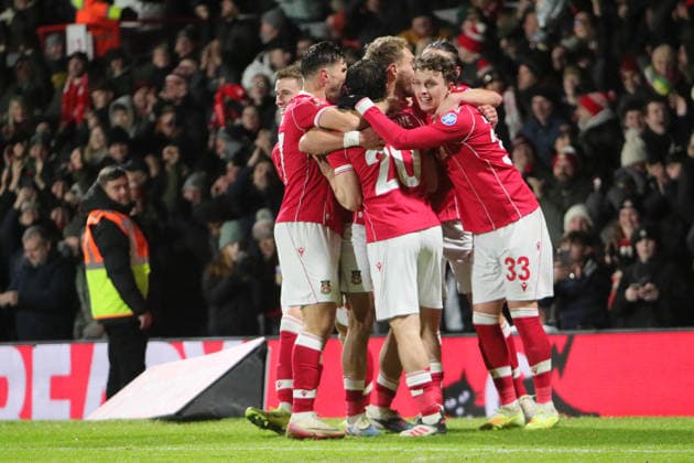 Wrexham FC v Nottingham Forest, FA Cup, 3rd Round Oliver Rathbone of Wrexham celebrates scoring their second goal with team mates during the FA Cup match between Wrexham FC and Nottingham Forest at the Racecourse Ground, Wrexham, UK on 9 January 2026. Wrexham Racecourse Ground Wales UK Editorial use only DataCo restrictions apply See www.football-dataco.com , Copyright: xAlunxRobertsx PSI-23552-0030