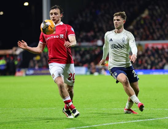 9th January 2026; Racecourse Ground, Wrexham, Wales; FA Cup Football, Wrexham versus Nottingham Forest; Ollie Rathbone of Wrexham AFC tracked by James McAtee of Nottingham Forest  RogerxEvans