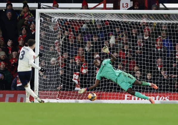 9th January 2026; Racecourse Ground, Wrexham, Wales; FA Cup Football, Wrexham versus Nottingham Forest; Neco Williams of Nottingham Forest scores their forth penalty for 6-6  RogerxEvans Content restricted for UK based newspaper