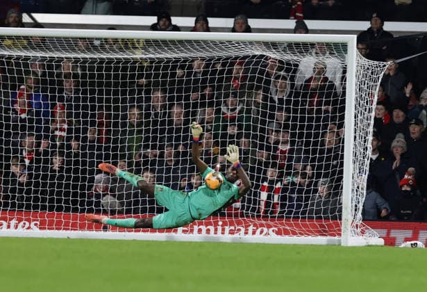9th January 2026; Racecourse Ground, Wrexham, Wales; FA Cup Football, Wrexham versus Nottingham Forest; Callum Doyle of Wrexham AFC penalty is saved by Arthur Okonkwo of Wrexham AFC for a 7-6 win for Wrexham  RogerxEvans Content restricted for UK based newspaper