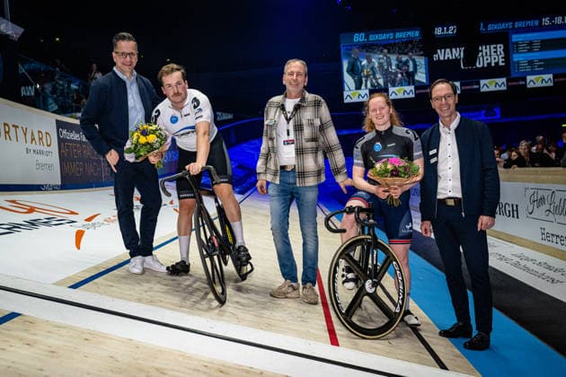 BOCK Benjamin, EDMUNDS Rhian: Sixdays Bremen 2026 Team 3 - BOBRINK - BOCK Benjamin ( GER ) - Team 2 - VELO TRACK - EDMUNDS Rhian ( GBR ) Award Ceremony - Medal Ceremony - Podium - Querformat - quer - horizontal - Landscape - Event Veranstaltung: Sixdays Bremen 2026 - Category Kategorie: Cycling - Track cycling, Rad, Radsport, Bahnrad, Bahn Sixdays - Elite Men and Women - Location Ort: Europe Germany - Bremen - ÖVB Arena - Discipline: Keirin - Distance: ... m - Date Datum: 09.01.2026 Friday Day 1 -