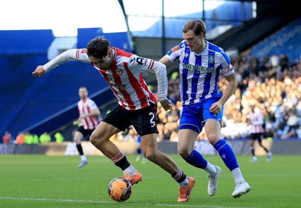 Aaron Hickey of Brentford in action against Svante Ingelsson of Sheffield Wednesday Sheffield Wednesday v Brentford, Emirates FA Cup, Third Round, Football, Hillsborough, Sheffield, UK - 10 Jan 2026Sheffield Hillsborough United Kingdom EDITORIAL USE ONLY No use with unauthorised audio, video, data, fixture lists, club league logos or live services. Online in-match use limited to 120 images, no video emulation. No use in betting, games or single club league player publications. Copyright: xGeorgexTewkesbury Shutterstockx 16246263aq