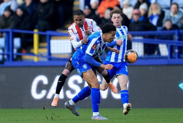 Rico Henry of Brentford in action against Gabriel Otegbayo of Sheffield Wednesday Sheffield Wednesday v Brentford, Emirates FA Cup, Third Round, Football, Hillsborough, Sheffield, UK - 10 Jan 2026Sheffield Hillsborough United Kingdom EDITORIAL USE ONLY No use with unauthorised audio, video, data, fixture lists, club league logos or live services. Online in-match use limited to 120 images, no video emulation. No use in betting, games or single club league player publications. Copyright: xGeorgexTewkesbury Shutterstockx 16246263at