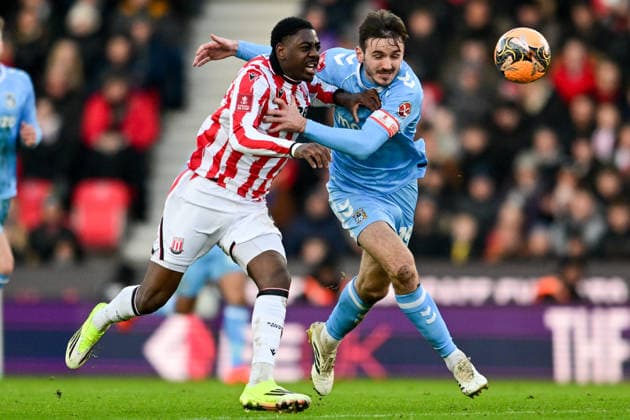 Stoke City v Coventry City, FA Cup, 3rd Round Stoke City forward (on loan from Manchester City) Divin Mubama (9) battles for possession with Coventry City midfielder Liam Kitching (15) during the FA Cup match between Stoke City and Coventry City at the Bet365 Stadium, Stoke-on-Trent, UK on 10 January 2026. Stoke-on-Trent Bet365 Stadium Staffordshire UK Editorial use only DataCo restrictions apply See www.football-dataco.com , Copyright: xDennisxGoodwinx PSI-23558-0036
