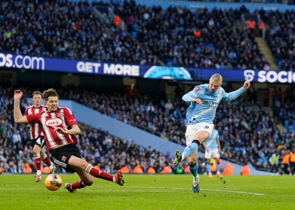 Manchester, England, 10th January 2026. Erling Haaland of Manchester City has his shot blocked during the Manchester City vs Exeter City FA Cup match at the Etihad Stadium, Manchester. Picture credit should read: Andrew Yates Sportimage EDITORIAL USE ONLY. No use with unauthorised audio, video, data, fixture lists, club league logos or live services. Online in-match use limited to 120 images, no video emulation. No use in betting, games or single club league player publications. SPI_041_AY_Man_City_Exeter SPI-4442-0040