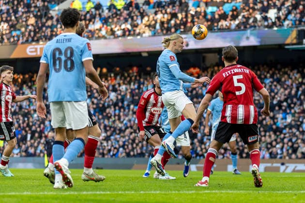10th January 2026; Etihad Stadium, Manchester, Lancashire, England; FA Cup Football, Manchester City versus Exeter City; Erling Haland of Manchester City heads the ball  TimxWilliams