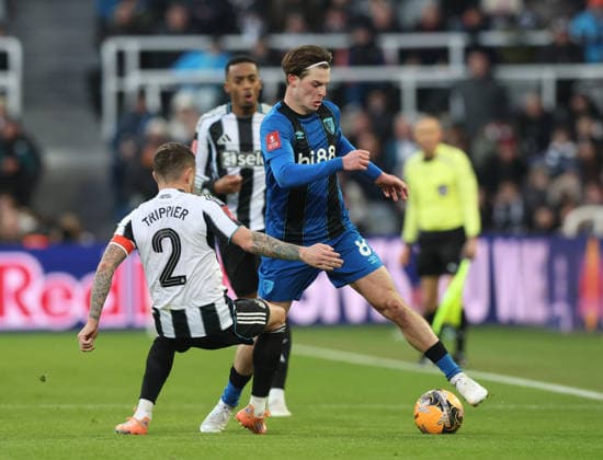 Newcastle Upon Tyne, England, 10th January 2026. Kieran Trippier of Newcastle United tackles Alex Scott of Bournemouth during the Newcastle United vs AFC Bournemouth FA Cup match at St. James Park, Newcastle Upon Tyne. Picture credit should read: Nigel Roddis Sportimage EDITORIAL USE ONLY. No use with unauthorised audio, video, data, fixture lists, club league logos or live services. Online in-match use limited to 120 images, no video emulation. No use in betting, games or single club league player publications. SPI_029_NR_NEWC_BOUR SPI-4441-0030