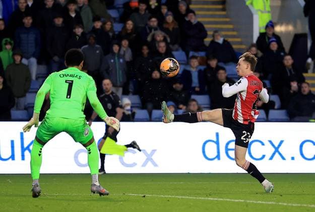Keane Lewis-Potter of Brentford attempts a shot on goal Sheffield Wednesday v Brentford, Emirates FA Cup, Third Round, Football, Hillsborough, Sheffield, UK - 10 Jan 2026Sheffield Hillsborough United Kingdom EDITORIAL USE ONLY No use with unauthorised audio, video, data, fixture lists, club league logos or live services. Online in-match use limited to 120 images, no video emulation. No use in betting, games or single club league player publications. Copyright: xGeorgexTewkesbury Shutterstockx 16246263bq