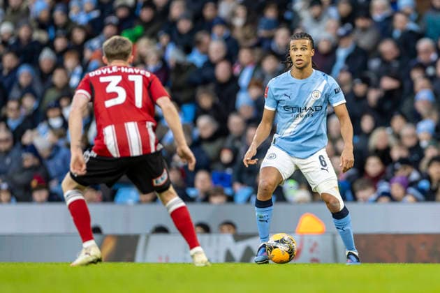 10th January 2026; Etihad Stadium, Manchester, Lancashire, England; FA Cup Football, Manchester City versus Exeter City; Nathan Ake of Manchester City looks to pass the ball  TimxWilliams