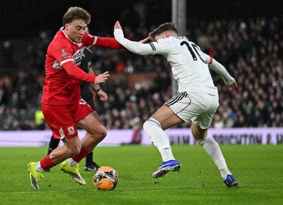 Fulham v Middlesbrough Emirates FA Cup Aidan Morris of Middlesbrough and Tom Cairney of Fulham during the Emirates FA Cup Third Round match at Craven Cottage, London 10 01 2026 UK Newspapers OUT Copyright: xNigelxBramleyx FIL-22780-0039
