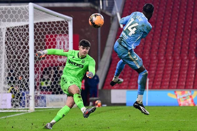 Stoke City v Coventry City, FA Cup, 3rd Round Stoke City goalkeeper Tommy Simpkin (25) clears under pressure from Coventry City midfielder (on loan from Crystal Palace) Romain Esse (14) during the FA Cup match between Stoke City and Coventry City at the Bet365 Stadium, Stoke-on-Trent, UK on 10 January 2026. Stoke-on-Trent Bet365 Stadium Staffordshire UK Editorial use only DataCo restrictions apply See www.football-dataco.com , Copyright: xDennisxGoodwinx PSI-23558-0060