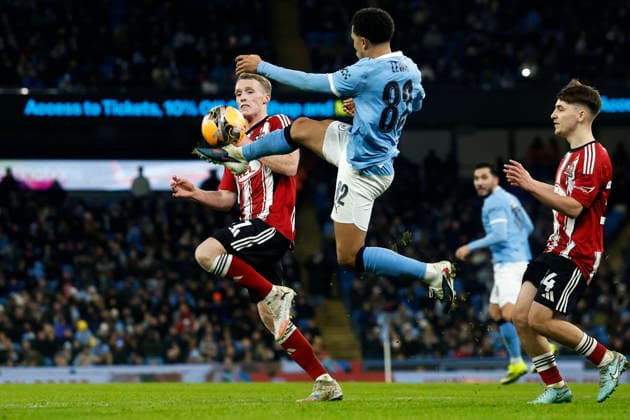 Manchester City v Exeter City, Manchester, UK - 10 January 2026 Rico Lewis of Manchester City feels pressure from Jake Doyle-Hayes of Exeter City during the Emirates FA Cup Round 3 match between Manchester City and Exeter City at The Etihad Stadium on 10 January 2026 in Manchester, England (Photo by Steve Taylor PPAUK) Manchester The Etihad Stadium Greater Manchester England Copyright: xStevexTaylor PPAUKx PPA-239654