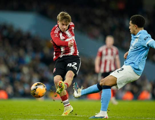 Manchester, England, 10th January 2026. George Birch of Exeter City scores a consolation goal during the Manchester City vs Exeter City FA Cup match at the Etihad Stadium, Manchester. Picture credit should read: Andrew Yates Sportimage EDITORIAL USE ONLY. No use with unauthorised audio, video, data, fixture lists, club league logos or live services. Online in-match use limited to 120 images, no video emulation. No use in betting, games or single club league player publications. SPI_057_AY_Man_City_Exeter SPI-4442-0056