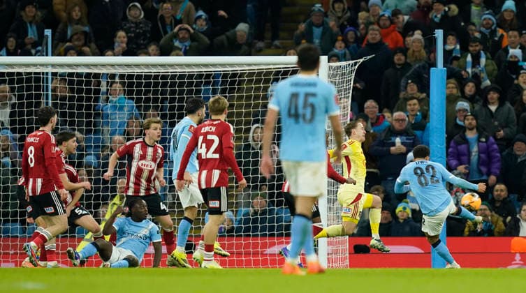 Manchester, England, 10th January 2026. Rico Lewis of Manchester City scores the tenth goal during the Manchester City vs Exeter City FA Cup match at the Etihad Stadium, Manchester. Picture credit should read: Andrew Yates Sportimage EDITORIAL USE ONLY. No use with unauthorised audio, video, data, fixture lists, club league logos or live services. Online in-match use limited to 120 images, no video emulation. No use in betting, games or single club league player publications. SPI_060_AY_Man_City_Exeter SPI-4442-0064
