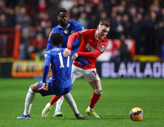 London, England, 10th January 2026. Dario Essugo of Chelsea (r) pushes past Andrey Santos of Chelsea (l) during the Charlton Athletic vs Chelsea FA Cup match at The Valley, London. Picture credit should read: Paul Terry Sportimage EDITORIAL USE ONLY. No use with unauthorised audio, video, data, fixture lists, club league logos or live services. Online in-match use limited to 120 images, no video emulation. No use in betting, games or single club league player publications. SPI_031_PT_Charlton_Chelsea SPI-4443-0031
