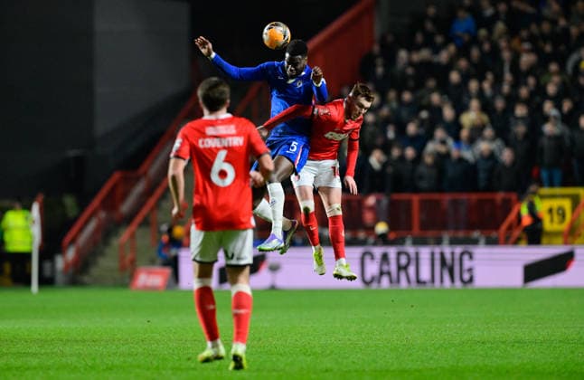 Charlton Athletic v Chelsea, London, UK - 10 Jan 2026 Benoit Badiashile of Chelsea wins the header from Sonny Carey of Charlton Athletic during the Emirates FA Cup match Third Round between Charlton Athletic and Chelsea on 10 January 2026 at The Valley, London - Charlton The Valley London England Copyright: xAlanxStanford PPAUKx PPA-239870