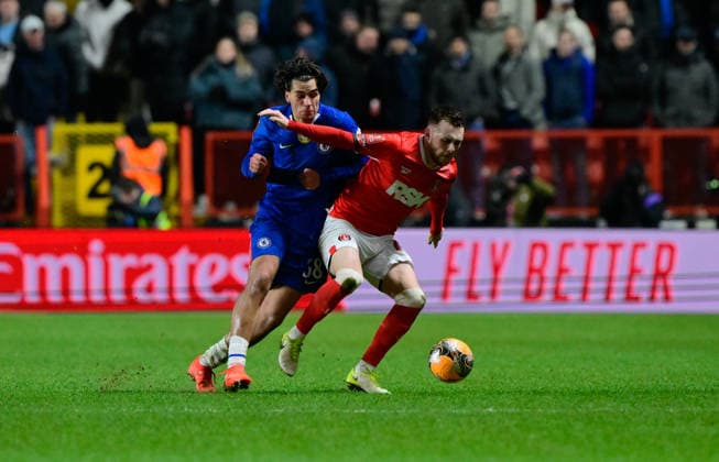 Charlton Athletic v Chelsea, London, UK - 10 Jan 2026 Marc Guiu of Chelsea and Sonny Carey of Charlton Athletic during the Emirates FA Cup match Third Round between Charlton Athletic and Chelsea on 10 January 2026 at The Valley, London - Charlton The Valley London England Copyright: xAlanxStanford PPAUKx PPA-239884