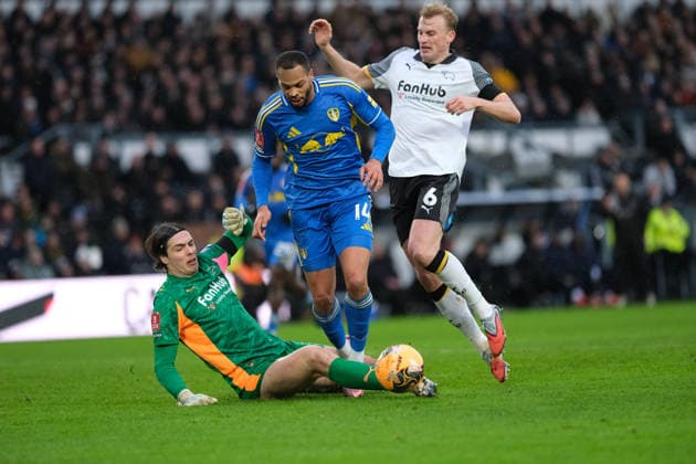 Jacob Widell Zetterstron of Derby County fouls Lukas Nmecha of Leeds United for a penalty during the Emirates FA Cup third round football match between Derby County and Leeds United at Pride Park Stadium in Derby. Copyright: xPaulxBonser SportsxPressxPhotox Sportspressphoto_SPR80774