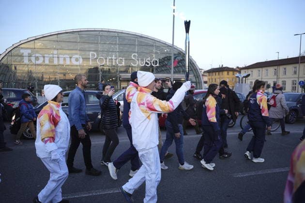 Turin, the arrival of the Milan-Cortina 2026 Olympic Flame, through the city along an 11 km route  Copyright: xriccardoxgiordanox xipa-agency.netx xriccardoxgiordanox IPA_Agency_IPA69938632