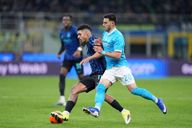Inter Milan s Luis Henrique fights for the ball with Napoli™s Eljif Elmas during the Serie A soccer match between Inter and Napoli at the San Siro Stadium in Milan , north Italy - Sunday , January 11 , 2026. - Soccer .  Copyright: xSpada LaPressex